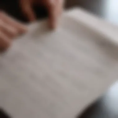 A person reviewing an insurance policy document