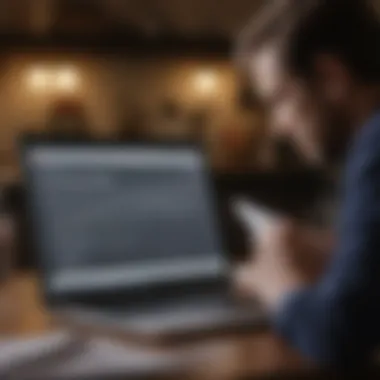 A person reviewing loan terms on a laptop