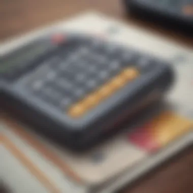 A close-up of a credit card with a calculator and financial documents