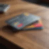 Close-up of two credit cards on a wooden table